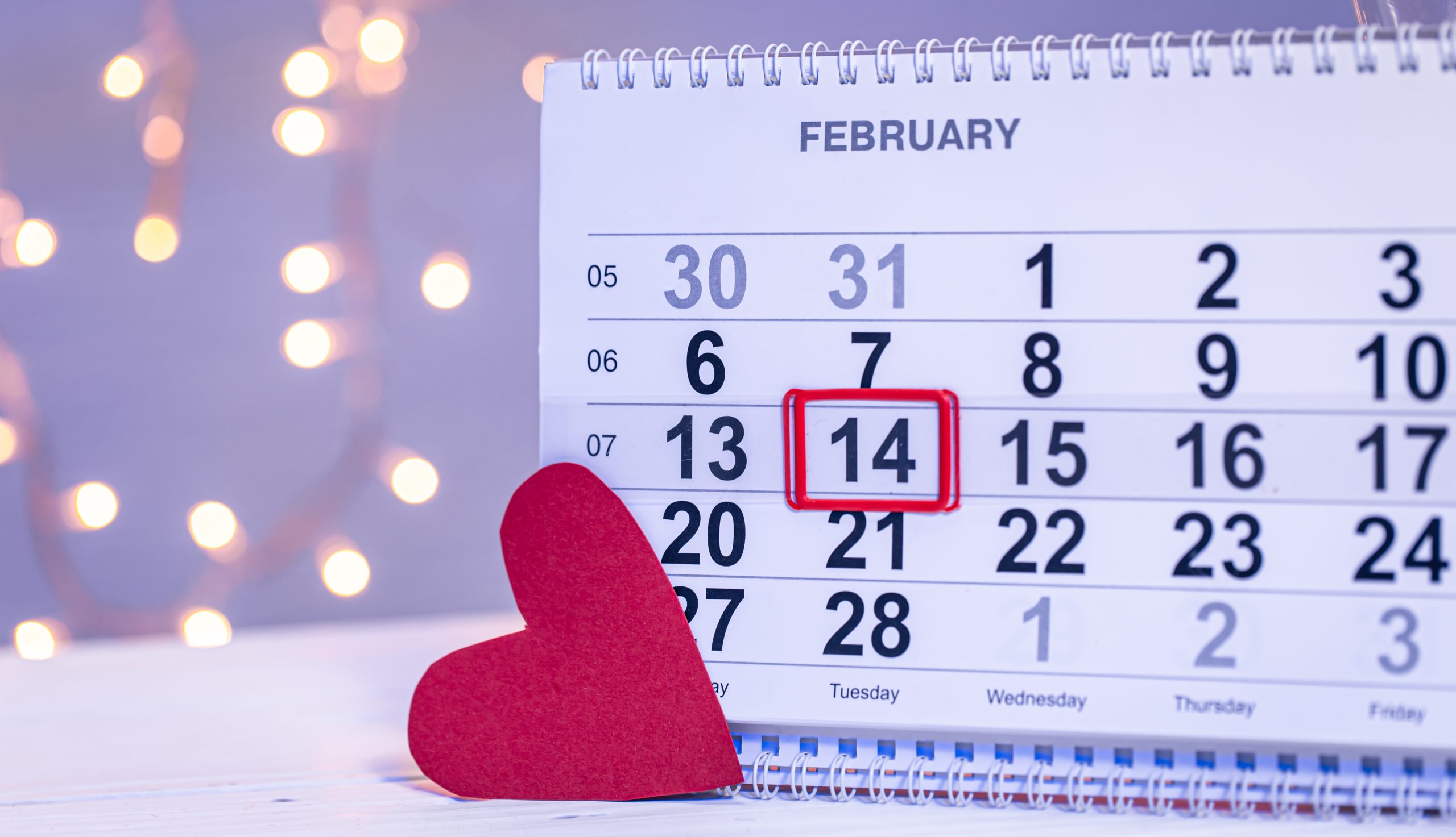 Calendar with the date February 14, a festive background for Valentine’s Day.